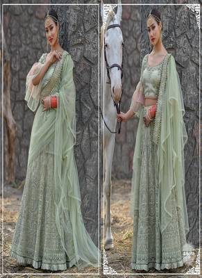 Green embroidered net semi stitched lehenga 2