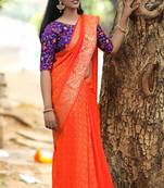 orange woven banarasi saree with blouse