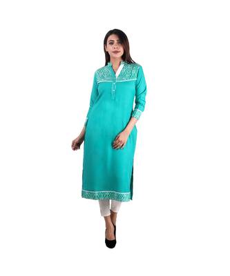 green printed rayon kurti 1