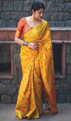 Yellow woven patola saree with blouse 1