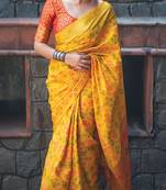 Yellow woven patola saree with blouse