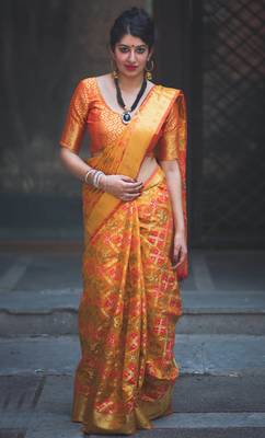 Mustard woven patola saree with blouse 1
