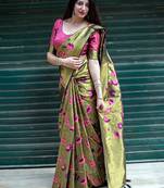 Green woven silk saree with blouse