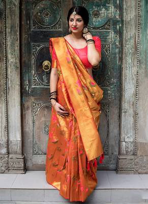 Orange woven silk saree with blouse 1