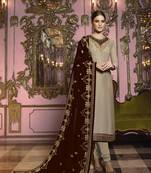 Beige salwar kameez with embroidered dupatta