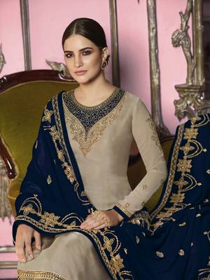 Beige salwar kameez with embroidered dupatta  2