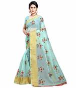 Light green embroidered organza saree with blouse