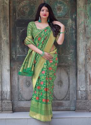 Green woven silk blend saree with blouse 2