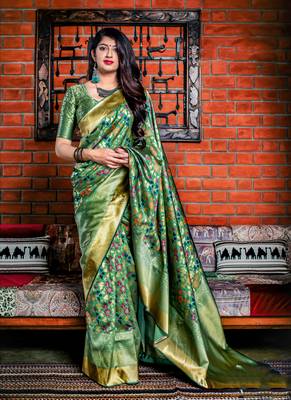 Green woven silk saree with blouse 1