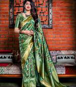Green woven silk saree with blouse
