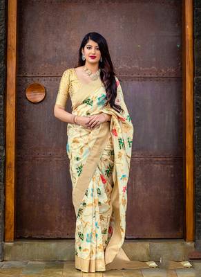   cream woven silk saree with blouse 1