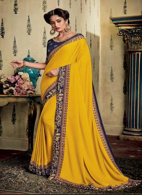 Yellow embroidered fancy fabric saree with blouse 1