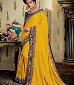 Yellow embroidered fancy fabric saree with blouse