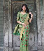 Green woven banarasi silk saree with blouse