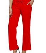 Red embroidered polyester trousers