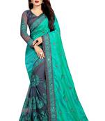 Sea Green embroidered georgette and net saree with blouse