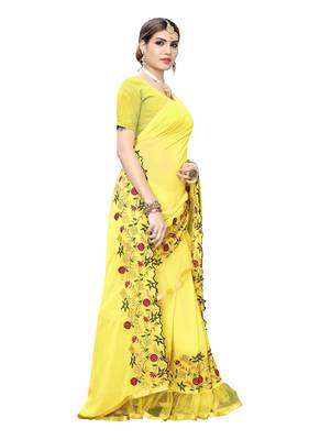 Yellow embroidered georgette saree with blouse 3