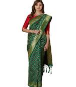 Green woven Silk blend saree with blouse