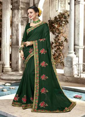   dark green embroidered fancy fabric saree with blouse 1
