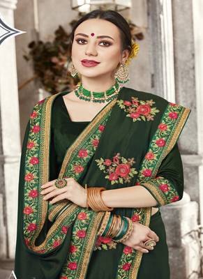   dark green embroidered fancy fabric saree with blouse 2