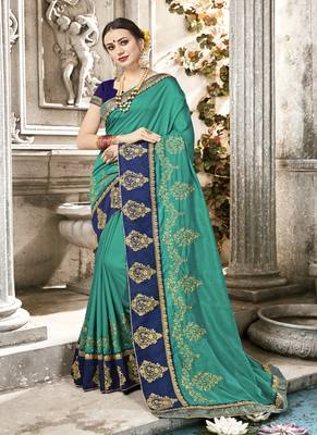 Teal Embroidered Fancy Fabric Saree With Blouse 1