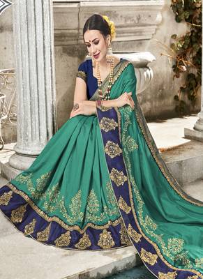 Teal Embroidered Fancy Fabric Saree With Blouse 2