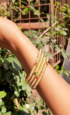Set Of Four White Pearl Bangles 1