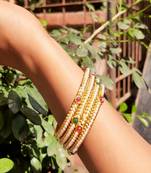 Set Of Four White Pearl Bangles