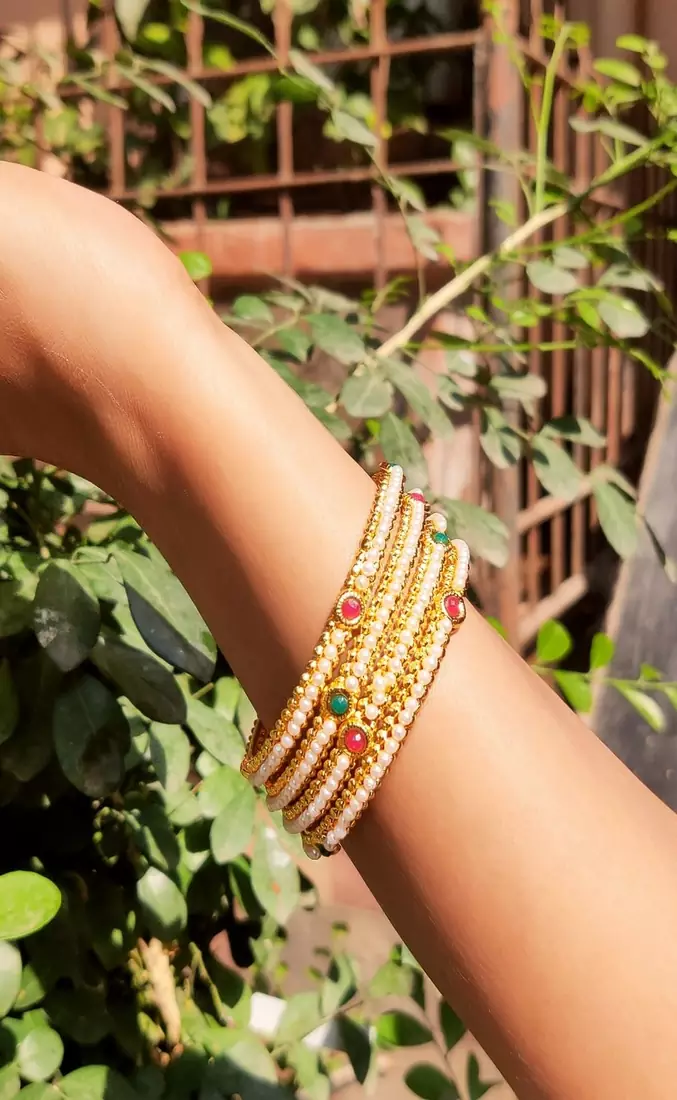 Set Of Four White Pearl Bangles