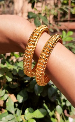 two gold bangles