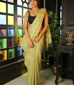 Light green woven silk blend saree with blouse