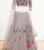 Grey embroidered net semi stitched lehenga