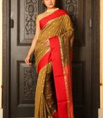 Dark yellow woven silk blend saree with blouse