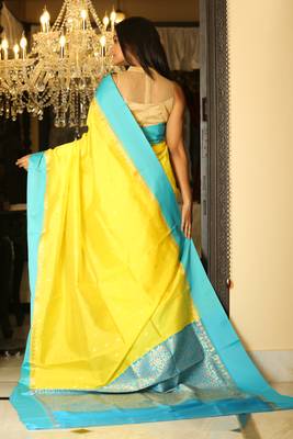 Yellow woven silk blend saree with blouse 2