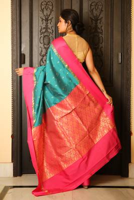 Turquoise woven silk blend saree with blouse 2