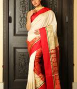 Off white woven silk blend saree with blouse