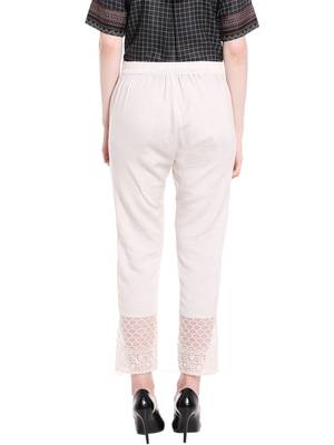 Off White Solid Pants With Lace At Bottom 3
