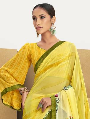 Yellow printed georgette saree with blouse 2