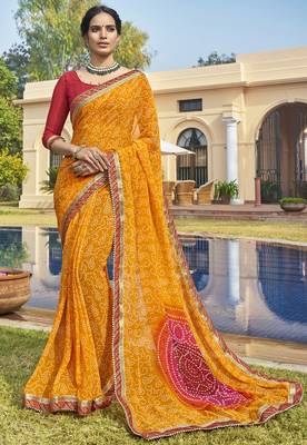 Mustard printed georgette saree with blouse 1