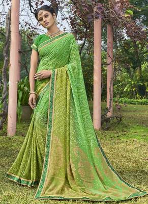 Green printed georgette saree with blouse 1