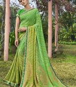 Green printed georgette saree with blouse