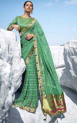 Green printed georgette saree with blouse 1