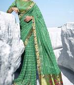 Green printed georgette saree with blouse