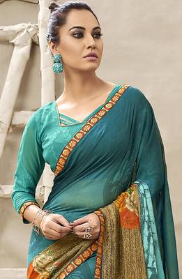 Turquoise printed georgette saree with blouse 2