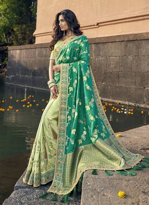 Teal woven silk blend saree with blouse 1