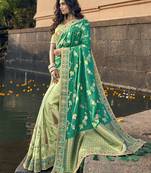 Teal woven silk blend saree with blouse