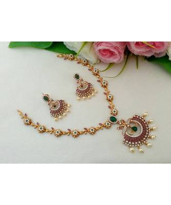 Eye Catching Matt Gold Finish Flower Design Necklace With Peacock Pendant & Matching Ear Rings 1