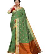 Green embroidered banarasi silk saree with blouse