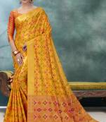 Orange plain silk saree with blouse