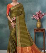 Green plain silk saree with blouse